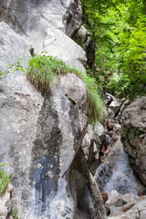 climbers in full equipment climb Slovenian ferrates