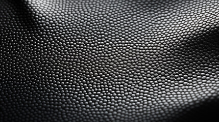 Black leather droplets pattern. Upholstery grain. Clean modern aesthetic. High quality metallic texture abstract background design. Grey coloured backdrop textured wallpaper patterned