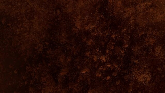 Super Slow Motion Shot of Cocoa Powder Surface Explosion at 1000fps.