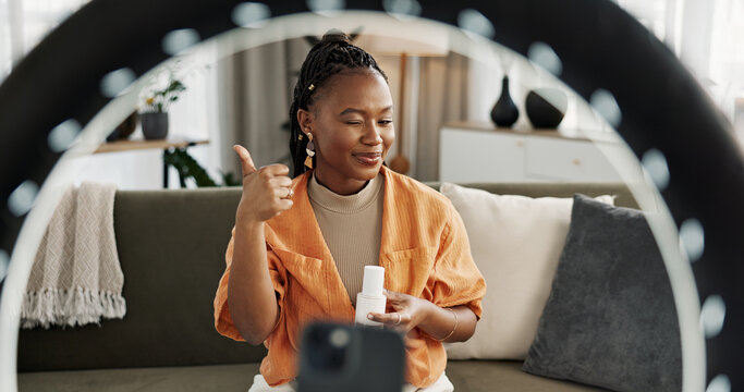 Video, influencer and black woman doing skincare for tutorial on social media or the internet. Dermatology, happy and young African female person filming or live streaming facial routine at home.