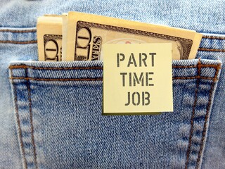 Dollars money in jeans pocket with sticky note PART TIME JOB , concept of increase more income from...