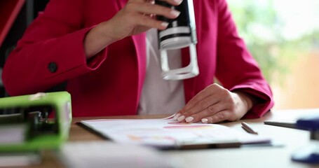 Seo holding rubber stamp and stamping statistical papers. Business marketing and office documents concept