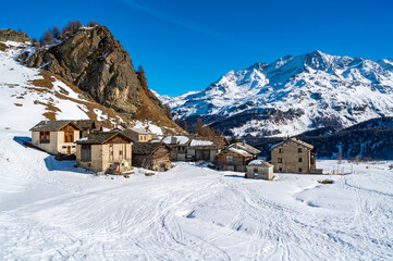 Panoramic view of the Engadine, Lake Sils, and the village Grevasalvas, in winter.