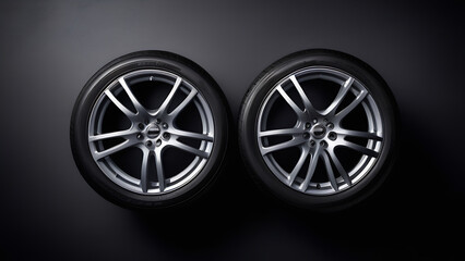 Car wheels on a black background
