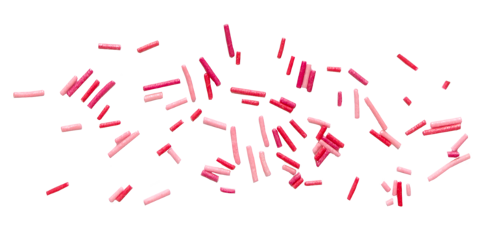Sweet sugar pink sprinkles pile, granules scattered isolated on transparent background, png, top view