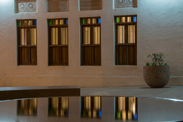 Fototapeta na wymiar Doha, Qatar- March 04,2023 : Views of the traditional Arabic architecture of market Souk Waqif.