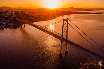 Hercilio luz bridge with warm sunset in Florianopolis. Aerial view