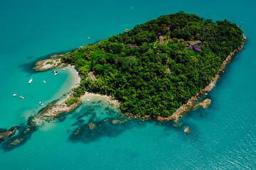 Island Ilha do Frances with boats and blue sea in Florianopolis, Brazil. Aerial view