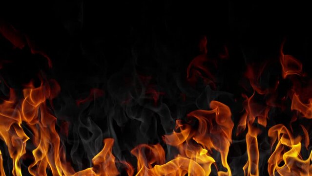 Super Slow Motion Shot of Real Fire Background Isolated on Black at 1000fps.