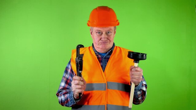 Plumber with adjustable wrench and toilet plunger.