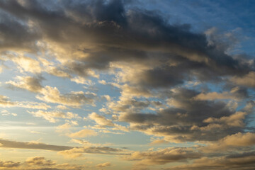 Fototapeta na wymiar Beautiful clouds at sunset. Vacation landscape.