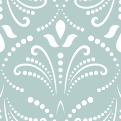 Floral light blue and white ornament. Seamless abstract classic background with white flowers. Pattern with repeating floral elements. Ornament for wallpaper and packaging