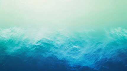 Fototapeta na wymiar Abstract representation of ocean waves with a smooth texture, transitioning from teal to deep blue, evoking a sense of calm and depth.
