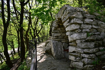 grotto and stone path on Mount Mashuk in early spring