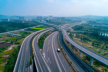 Aerial view of highway and overpass in city