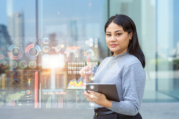 Smart businesswomen finger touch business data chart graph overlay graphics for Information technology for business analysis system concept