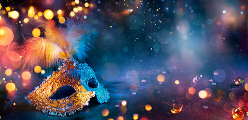 Carnival - Venetian Mask With Bokeh Lights - Masquerade Disguise With Confetti On Abstract Defocused Background - 730031127