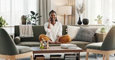 Black woman on sofa, relax and phone call for good news, conversation and connection with smile in...