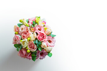 Colorful flower bouquet from roses isolated on white background. Fresh, lush bouquet of colorful flowers. Original flower bouquet. Multi-colored bouquet of flowers