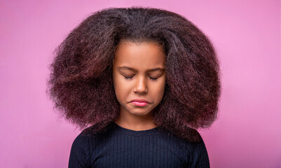Portrait upset little african american. Emotions and sorrow, bad mood, being sad, unhappy. Sad offended american girl cries. Little unhappy afro girl. Alone and scared, sad depressed children crying - obrazy, fototapety, plakaty