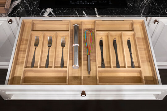 Wood kitchen drawer organizer, utensil holder with simple set of kitchen tools, furniture details