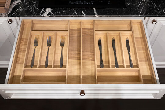 Wood kitchen drawer organizer, utensil holder with simple set of kitchen tools, furniture details