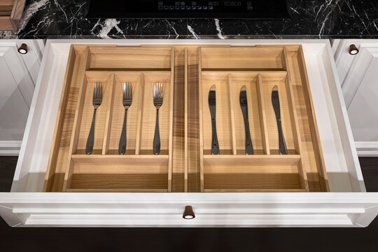 Wood kitchen drawer organizer, utensil holder with simple set of kitchen tools, furniture details