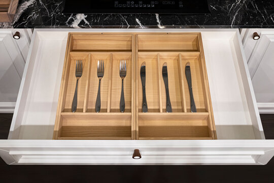 Wood kitchen drawer organizer, utensil holder with simple set of kitchen tools, furniture details