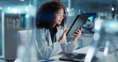 Tablet, laptop and woman scientist in lab working on medical research, project or experiment....