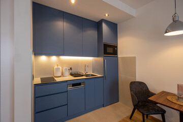Kitchen interior with blue elements