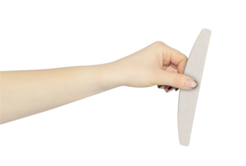 nail file or brush in hand, outstretched hand with nail file or brush isolated from background