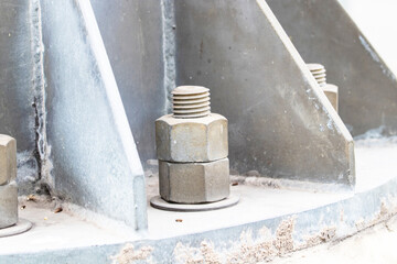 Bolts and screws. Old big Metal male square nut screw nail heads stackable to attach to large light pole bases. To attach structure of wall to be strong for house or various industrial.