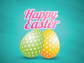 Glossy Two Painted Eggs on Light Blue Texture Background for Happy Easter Celebration Concept.