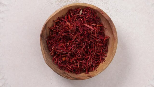  saffron dry spice top view on light surface