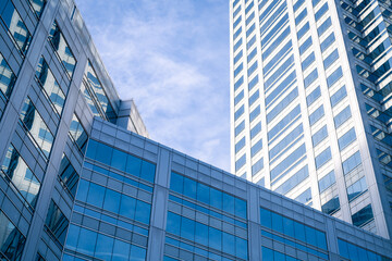 Glass business office building in a modern city. Financial center building. Exterior view of modern...
