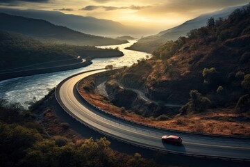 Winding road in the autumn forest. The concept of active and extreme tourism