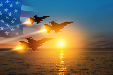 Air Force Day. Aircraft silhouettes on background of sunset on the sea.