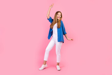 Full length photo of funky pretty girl wear blue shirt enjoying discotheque isolated pink color...