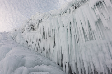 Fototapeta na wymiar Frozen Icicles Of Ice In Nature