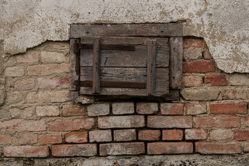 Croatia, October 20,2023 : Rustic style aged window at rural home wall.