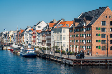 Fototapeta na wymiar Famous old Nyhavn harbor with colorful houses in the center of Copenhagen, Denmark.