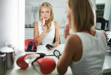 Woman, wipe and boxing gloves by mirror, makeup and stylish outfit in dressing room. Female person,...
