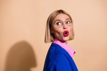 Portrait photo of blonde bob hair lady in blue jumper shocked pouted lips red pomade look novelty...