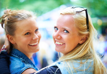 Portrait, girls and happy friends at music festival outdoor, event or bonding at concert. Face,...