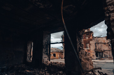 Fototapeta na wymiar destroyed and burned houses in the city during the war in Ukraine.