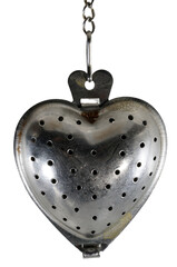 Metal heart on a chain on a white background.