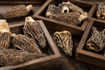 angle view morel on wood trays at horizontal composition - obrazy, fototapety, plakaty