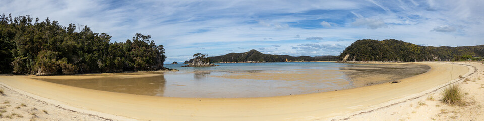 panoramic beach abel tasman island new zealand