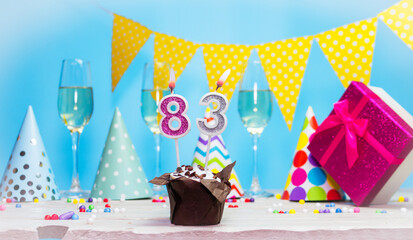 Date of birth for woman or girl with birthday box. Pie with number of candles  83. Anniversary...