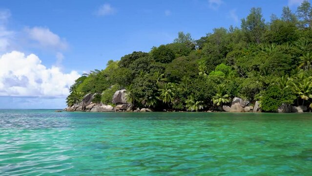 Tropical island. Gorgeous wild beach with green trees. amazing blue ocean sea sand in Seychells 